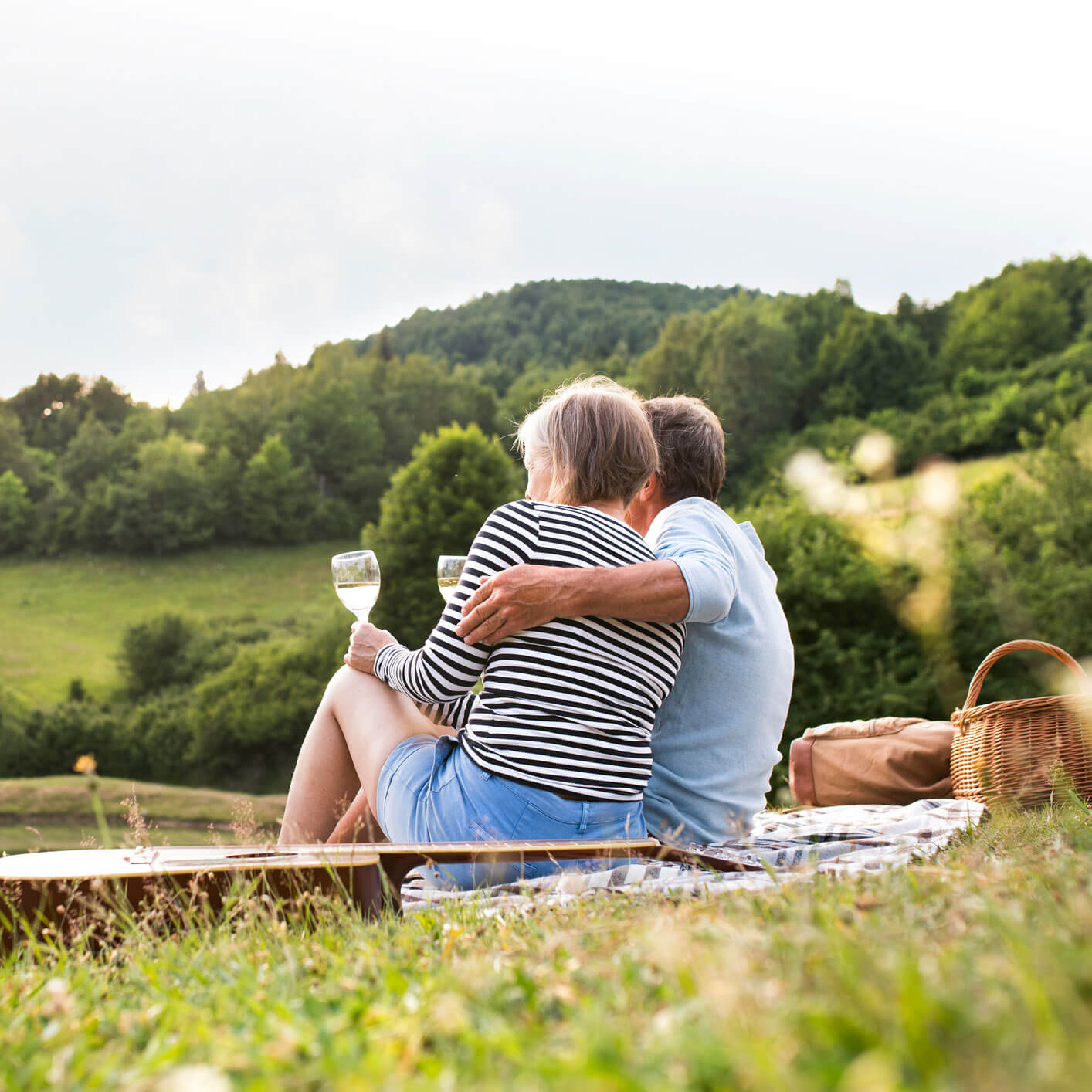 couple enjoying wine outside